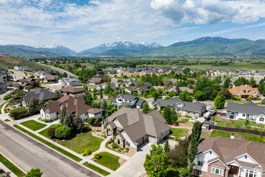 Aerial view of residential area with a mountain backdrop