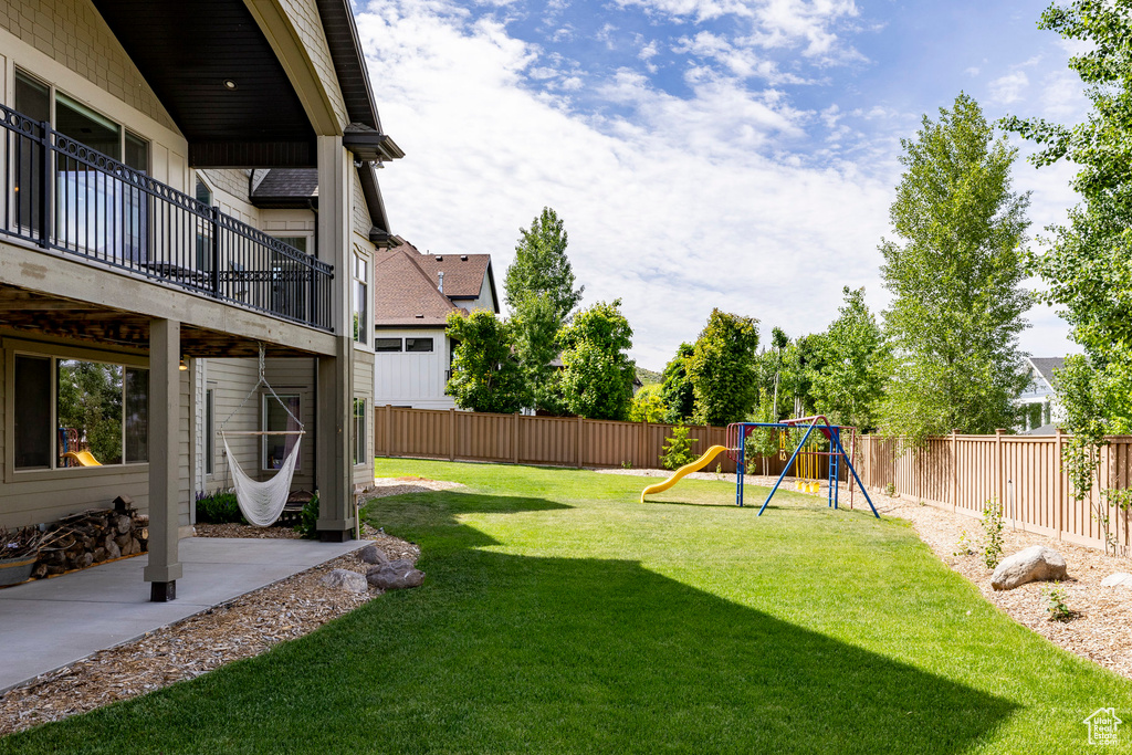 View of yard with a playground