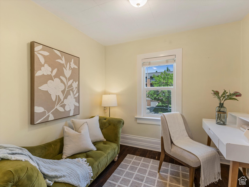 Home office with wood finished floors and baseboards