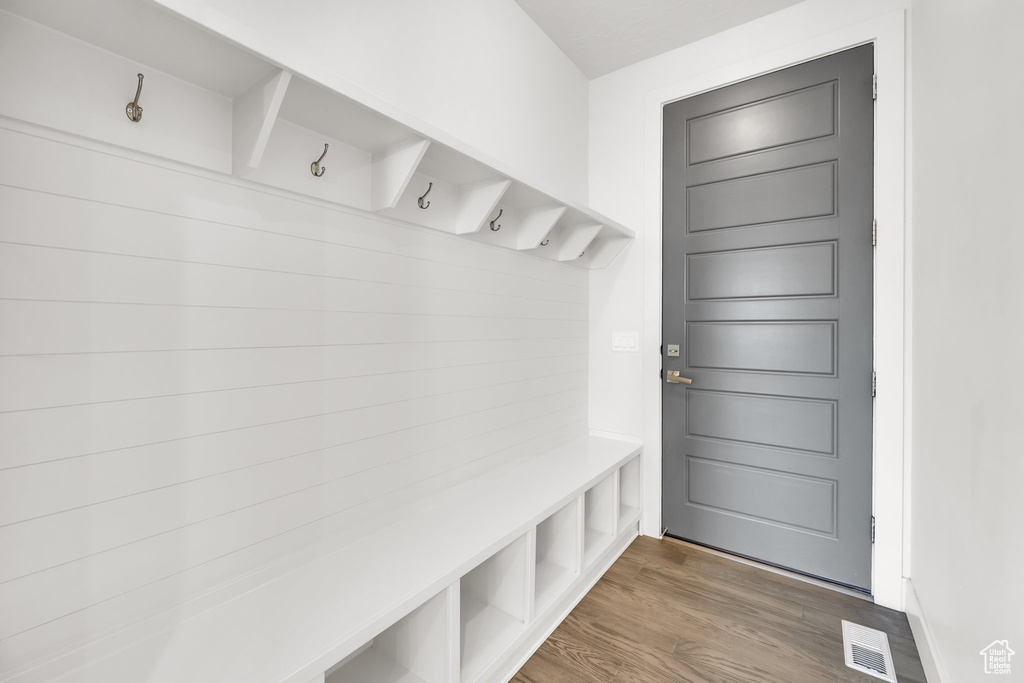 Mudroom with wood finished floors