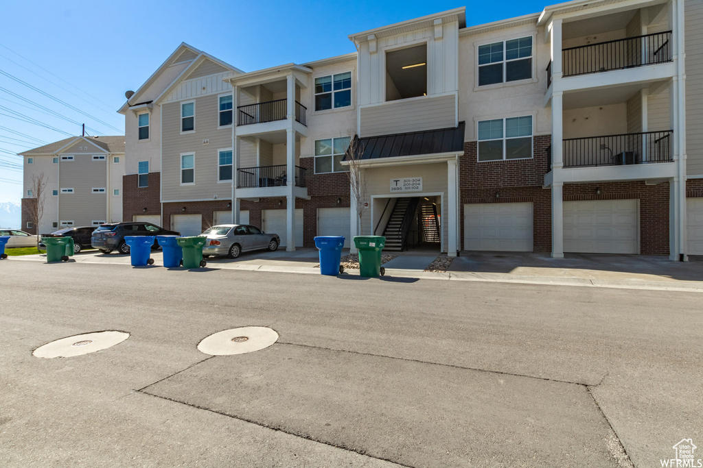 View of property featuring an attached garage