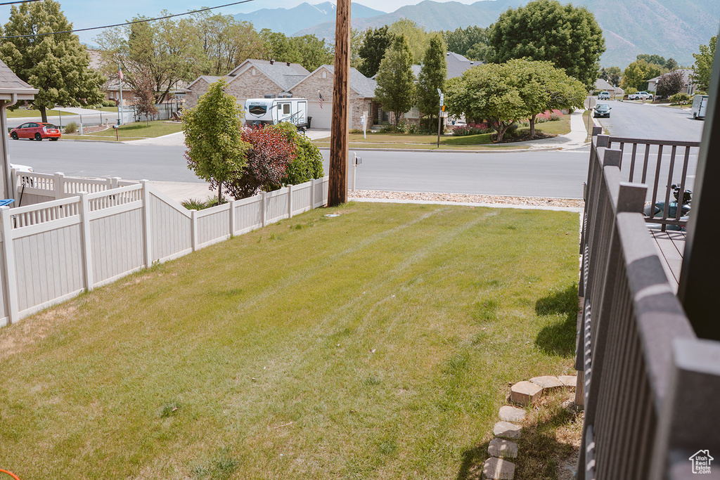 View of yard featuring a mountain view and a residential view