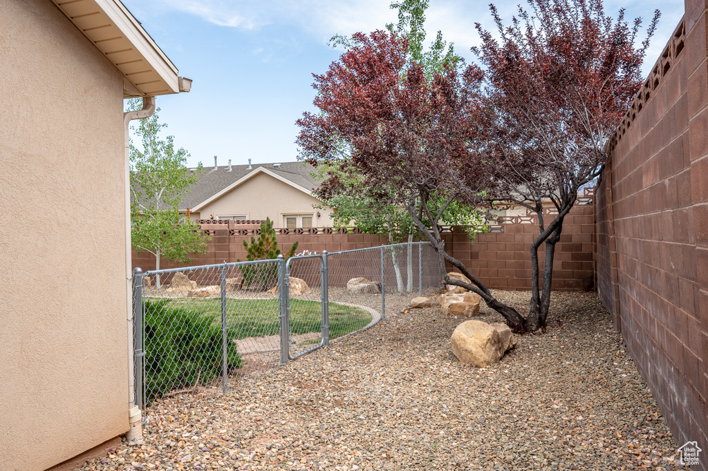 View of fenced backyard