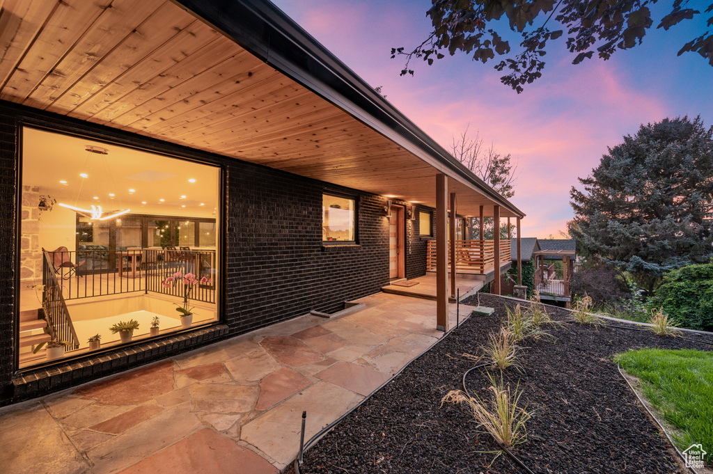 Patio terrace at dusk with a patio area