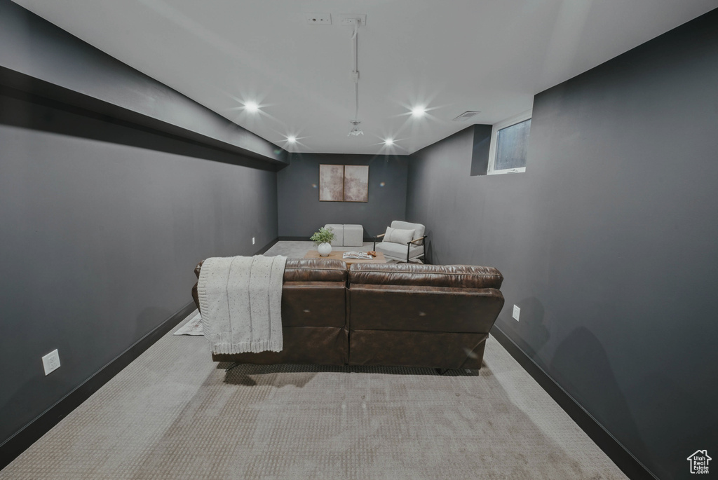 Home theater room featuring carpet flooring, baseboards, plenty of natural light, and recessed lighting