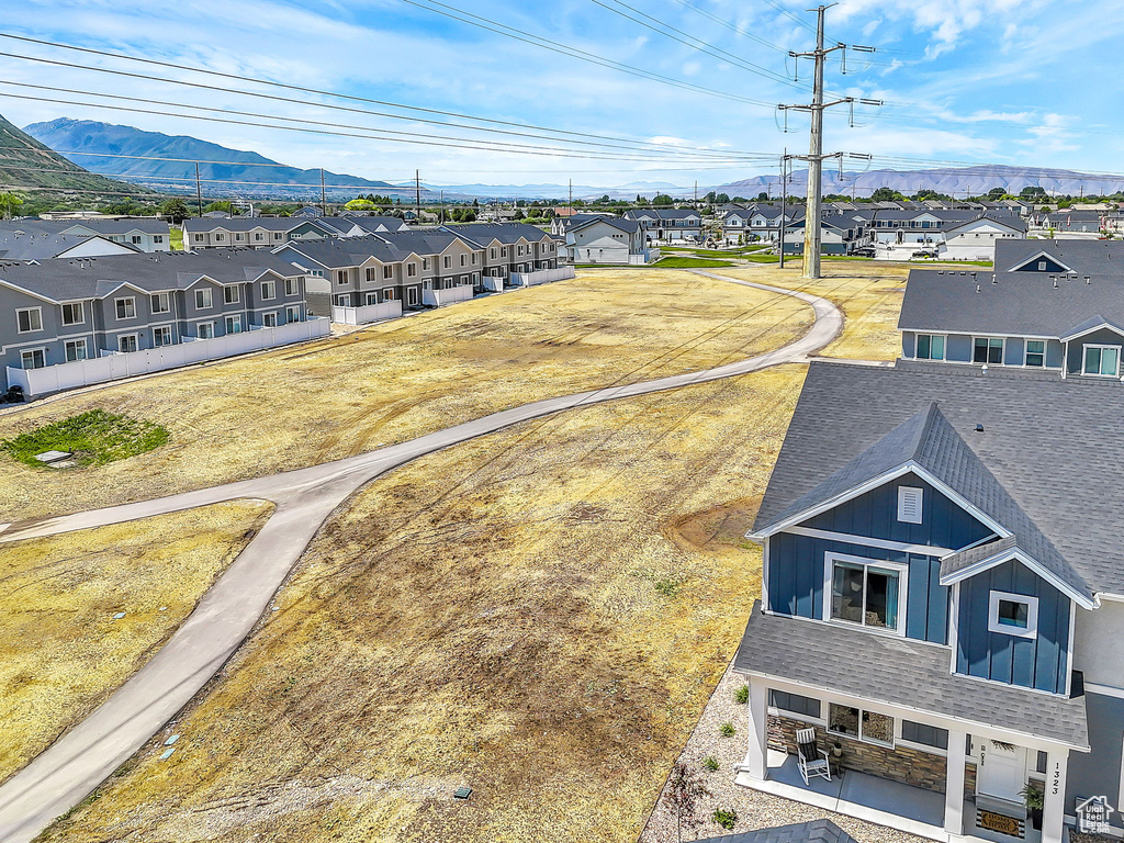 Aerial view of residential area with a mountainous background