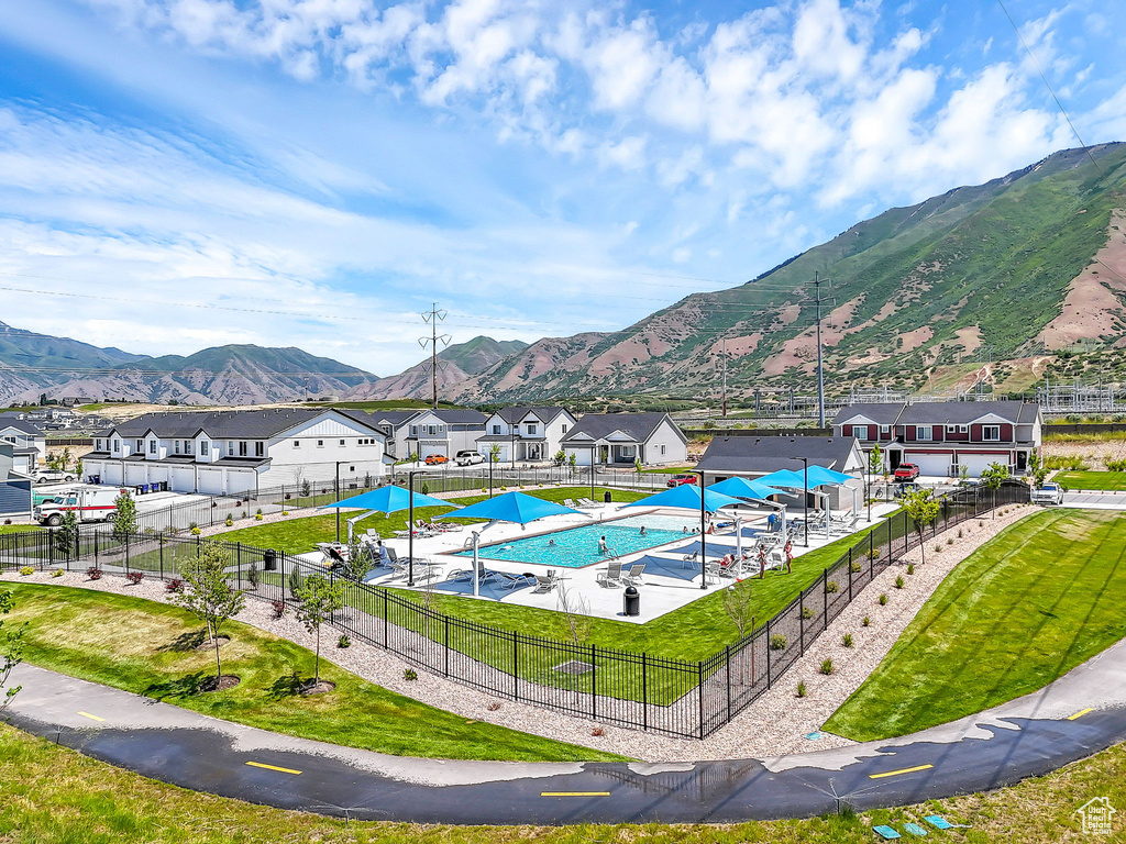 View of swimming pool with a mountain view and a residential view