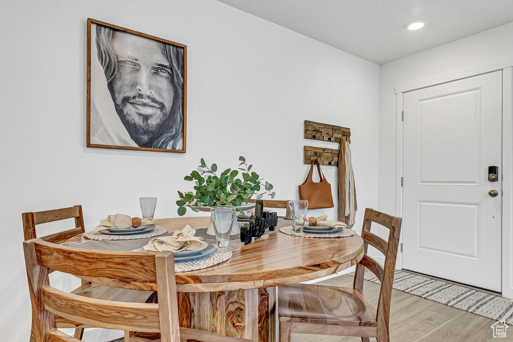 Dining area featuring light wood-style flooring
