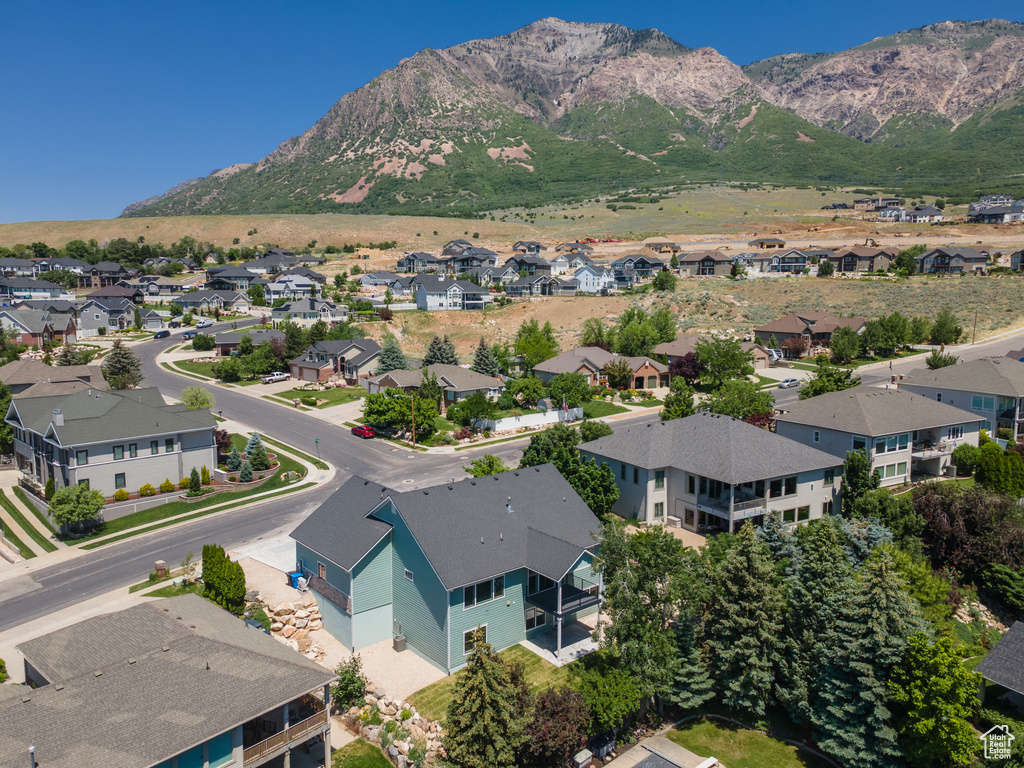 Aerial view of residential area with a mountain backdrop