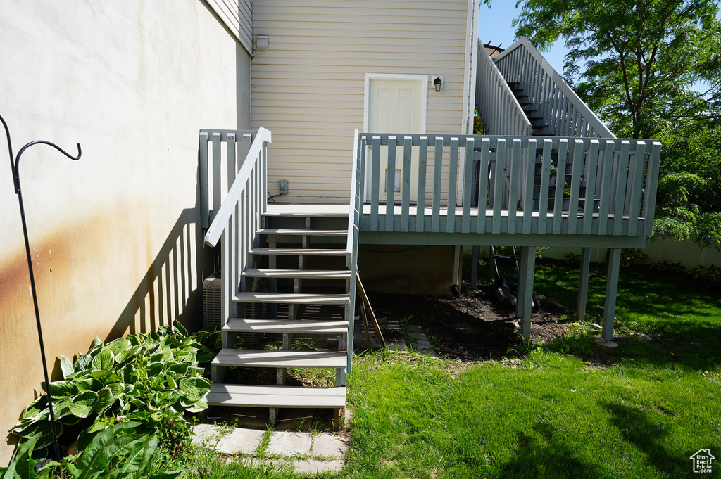 Wooden terrace featuring stairway