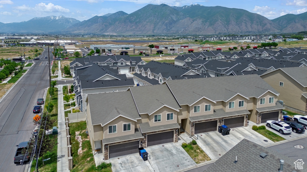 Aerial view of residential area with a mountain backdrop