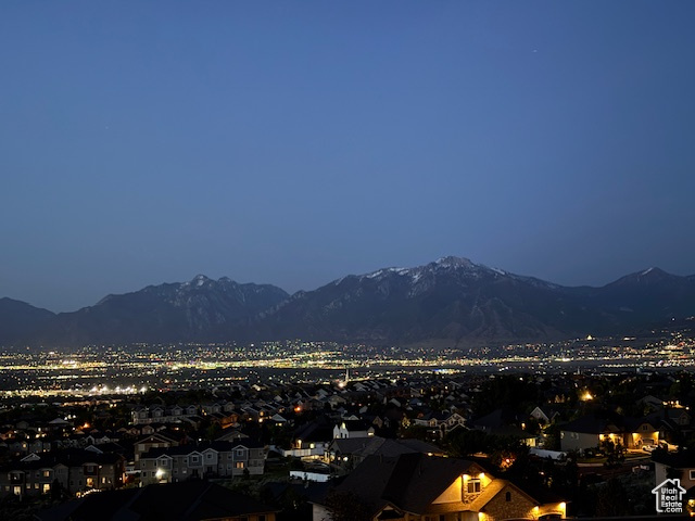 Mountain view featuring nearby suburban area
