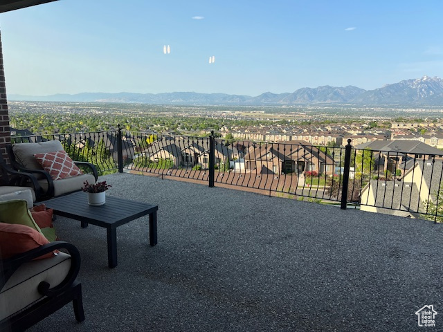 Balcony with a mountain view and a residential view