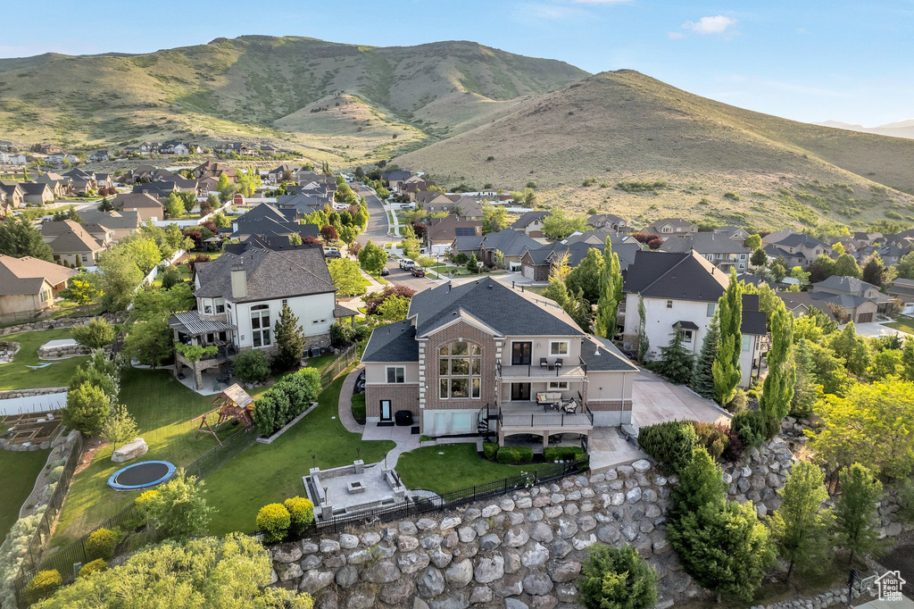 Aerial view of residential area with mountains