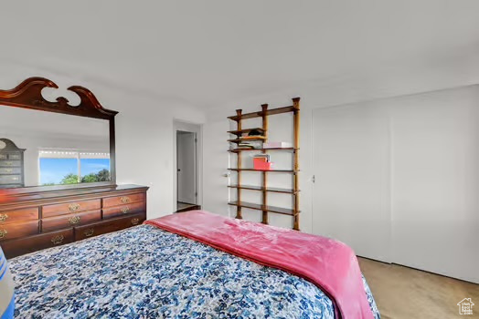 Bedroom featuring carpet flooring