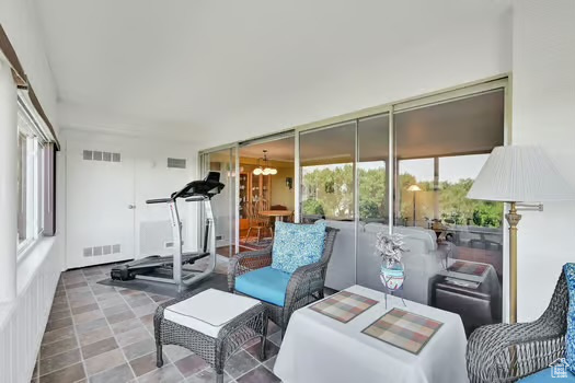 Sunroom / solarium featuring outdoor lounge area