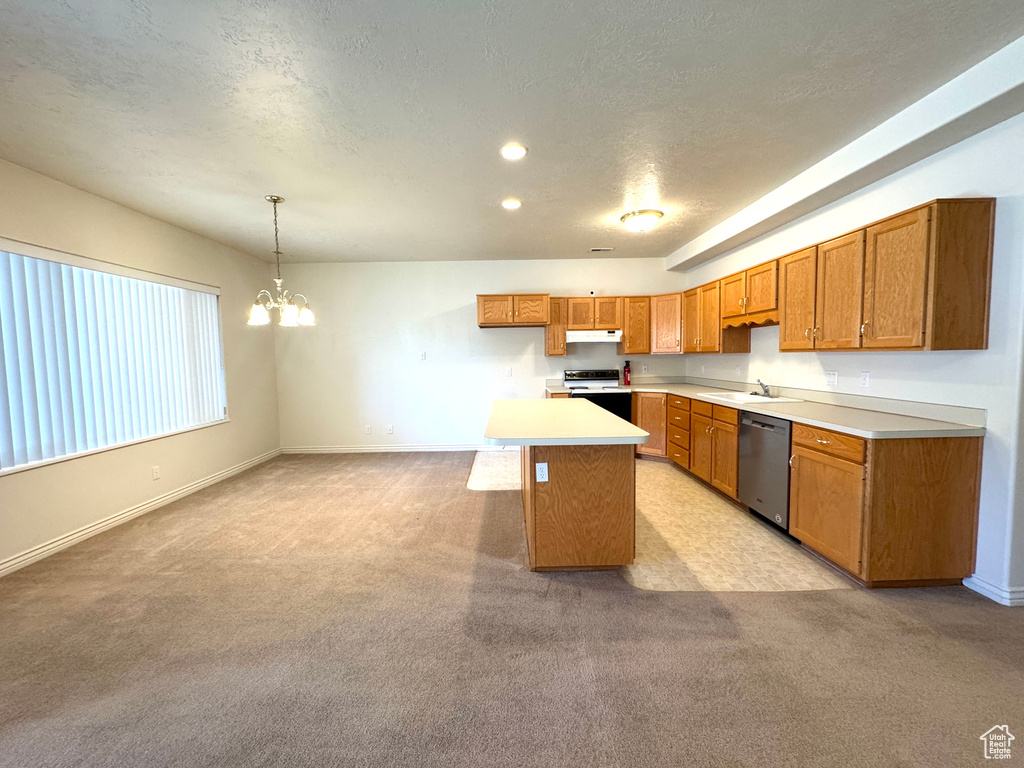 Kitchen with stainless steel dishwasher, white electric stove, a sink, brown cabinetry, and light colored carpet