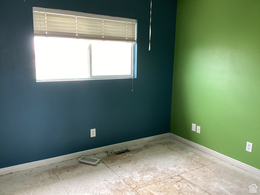 Spare room with baseboards
