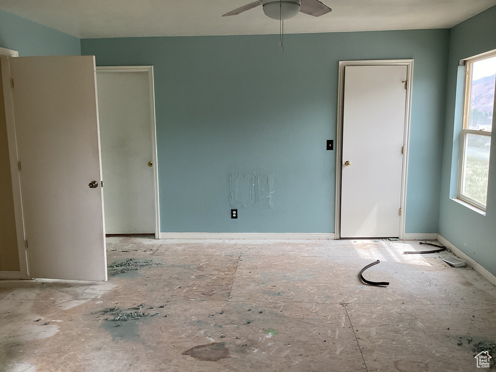 Spare room with a ceiling fan