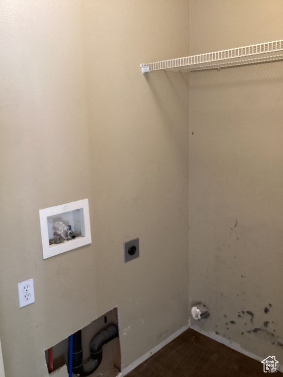 Laundry room with washer hookup, electric dryer hookup, and baseboards