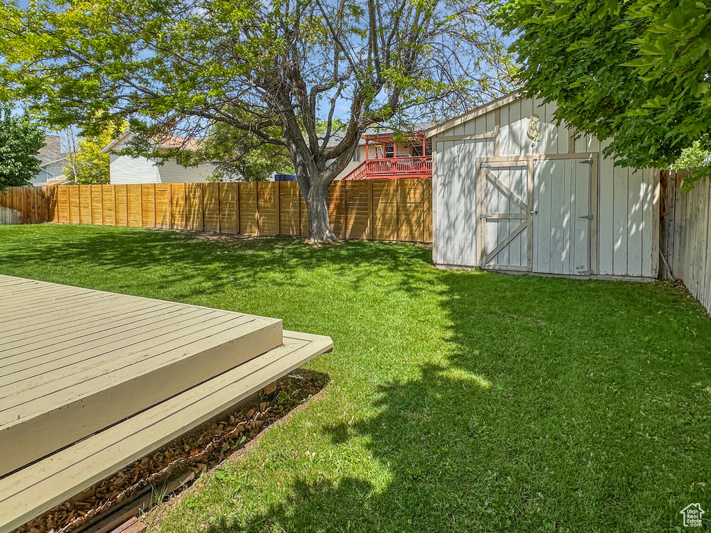 View of yard with a deck