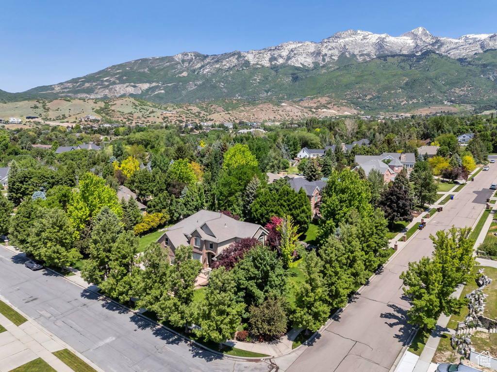 Aerial view of residential area featuring mountains