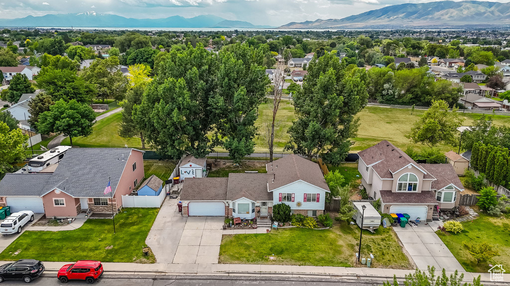 Aerial view of residential area featuring mountains