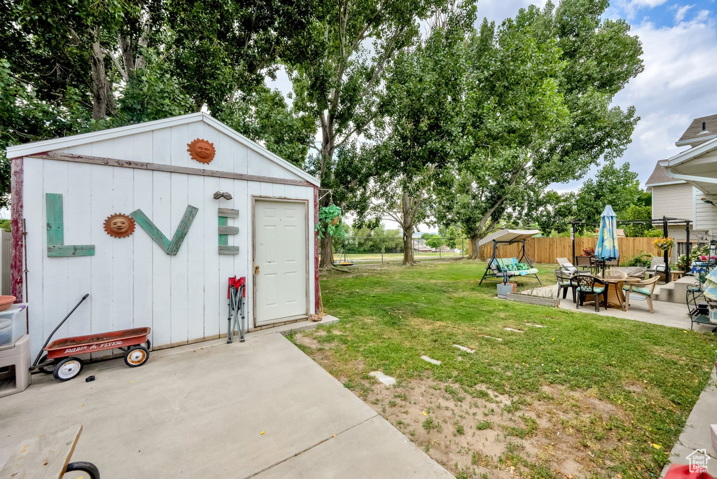 View of yard with a patio area