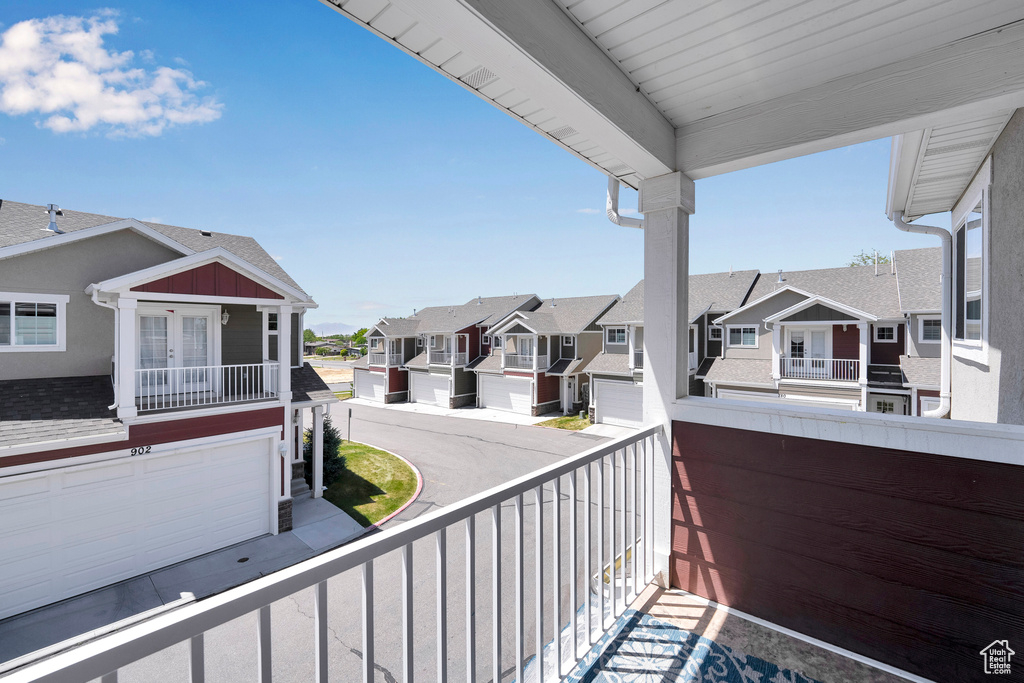 Balcony with a residential view and french doors