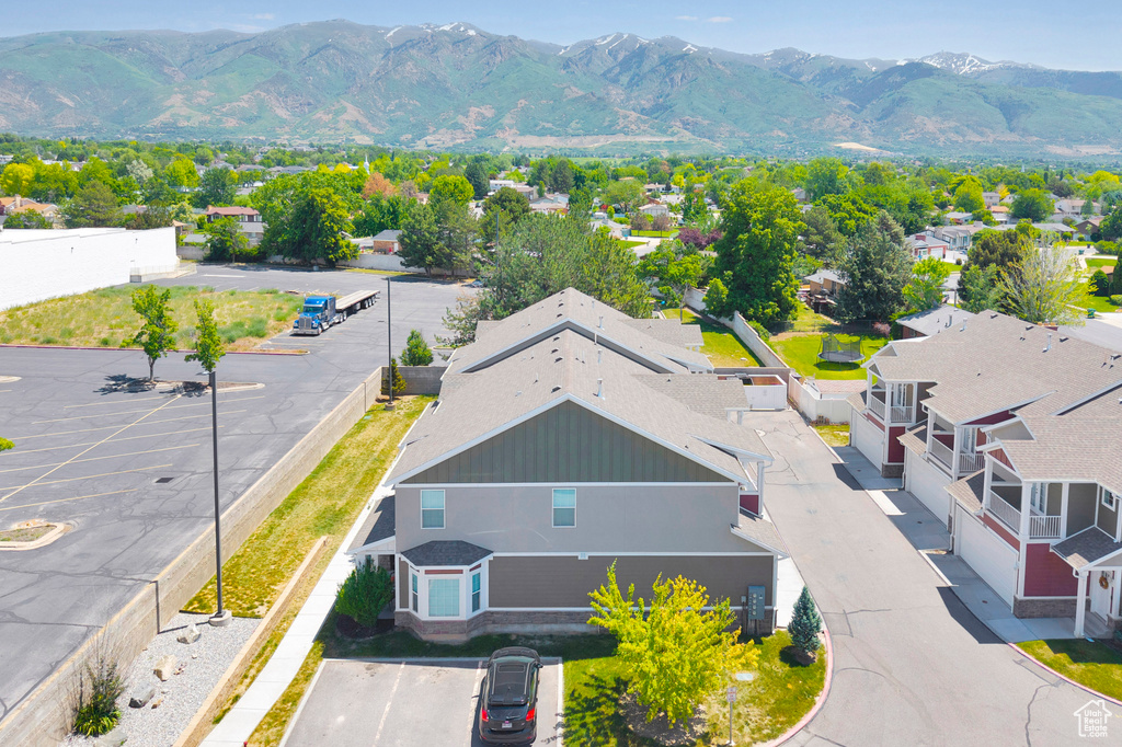 View of subject property with a mountain backdrop