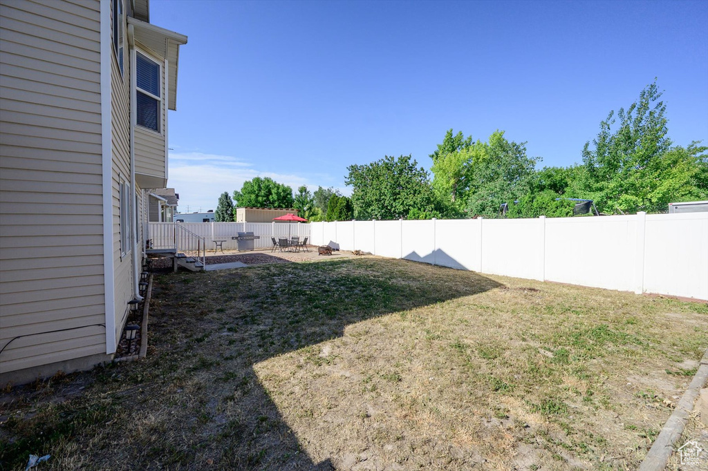 View of yard featuring a patio