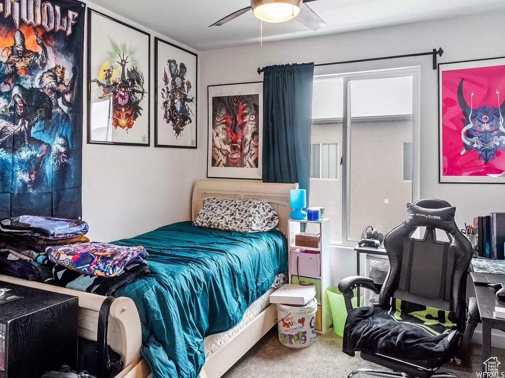 Bedroom with carpet flooring and ceiling fan
