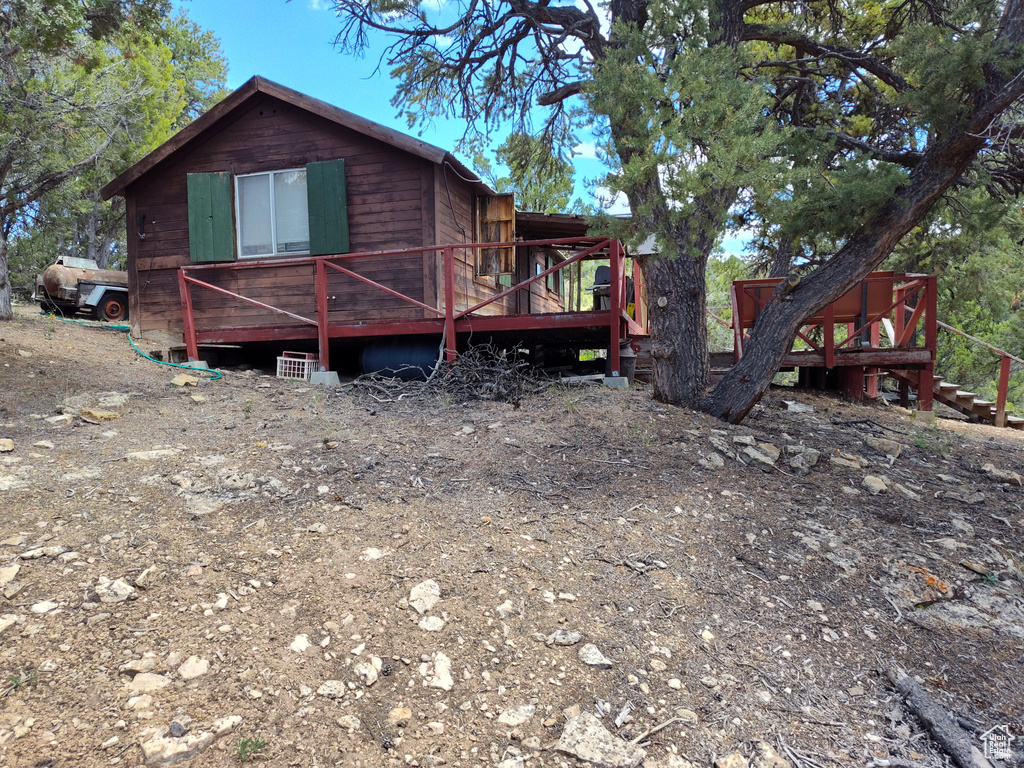 View of front facade featuring a deck