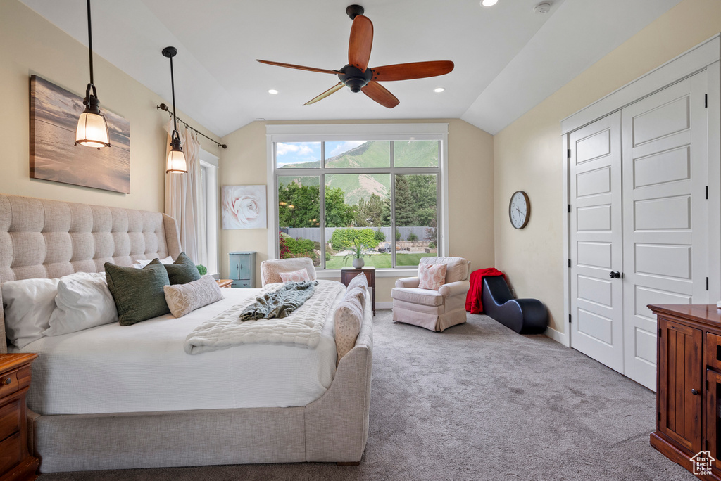 Bedroom featuring vaulted ceiling, carpet floors, recessed lighting, a ceiling fan, and a closet