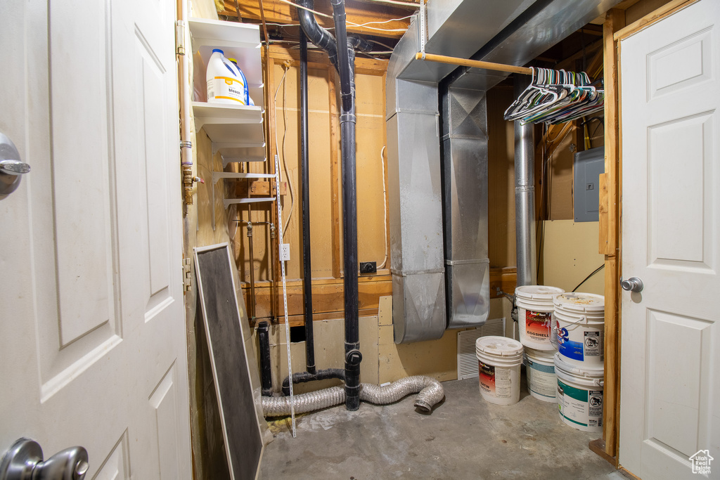 Unfinished below grade area with electric panel