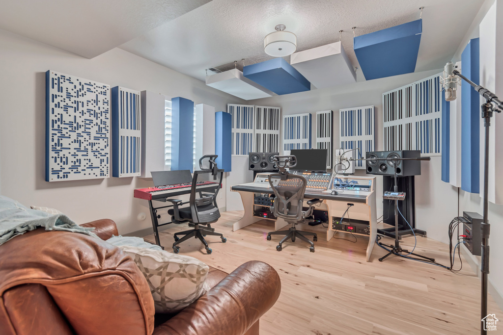 Office area with wood finished floors