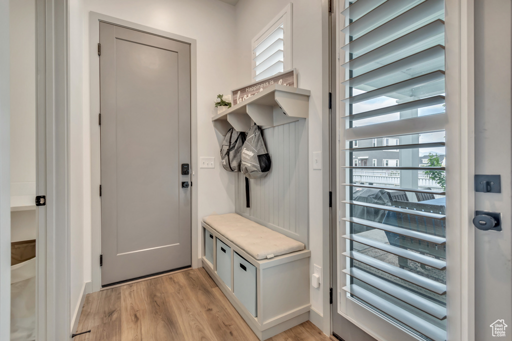 Mudroom featuring light wood-style floors