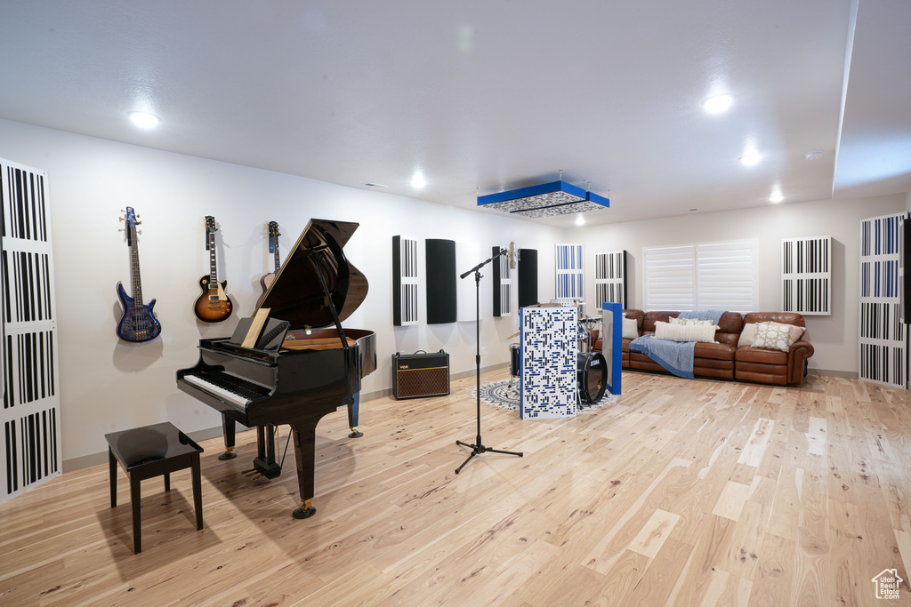 Misc room featuring wood finished floors and recessed lighting