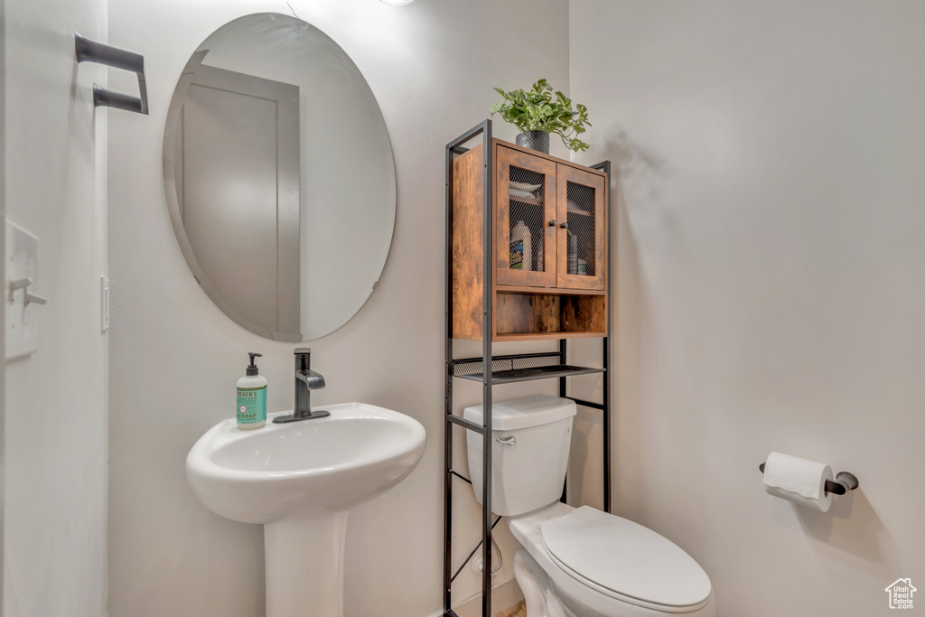 Bathroom with toilet and a sink