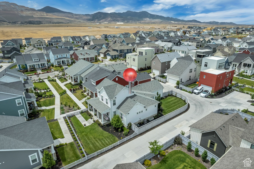 Aerial view of residential area with mountains