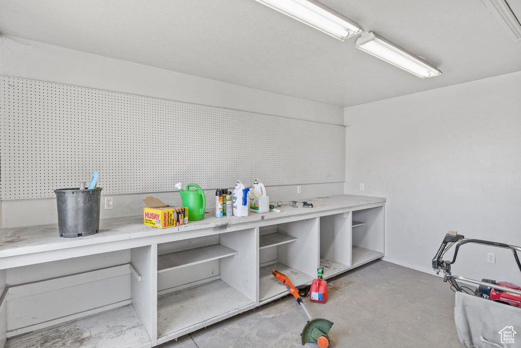 Miscellaneous room featuring concrete floors