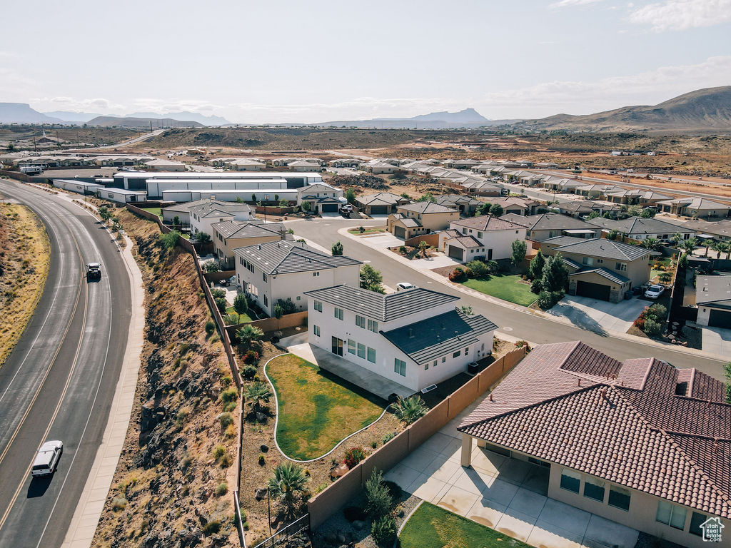 Aerial view of residential area with mountains