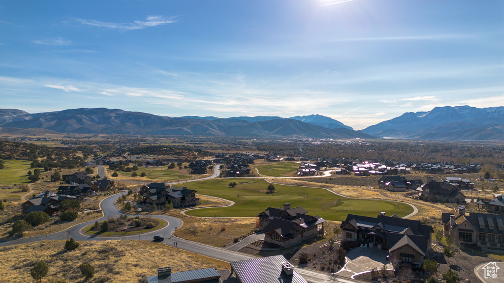 Mountain view with nearby suburban area and a local golf course