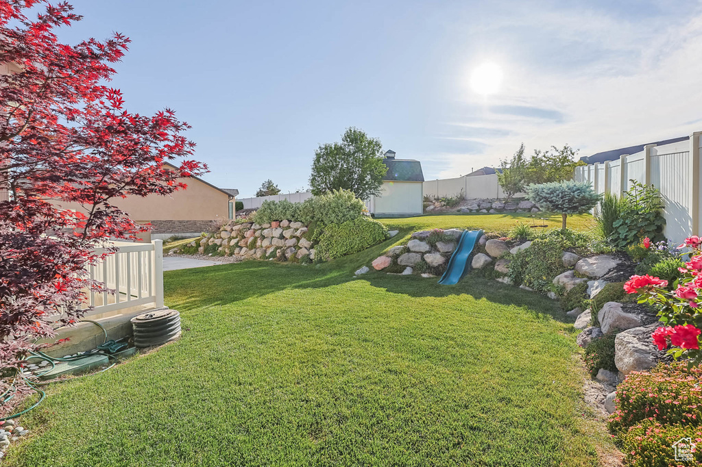 View of yard with a playground
