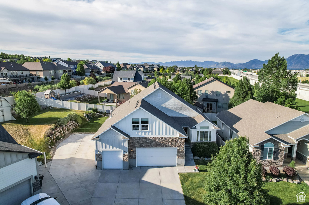 Aerial view of residential area with mountains