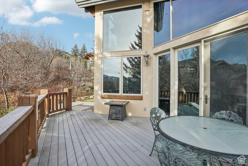 Wooden deck with outdoor dining space