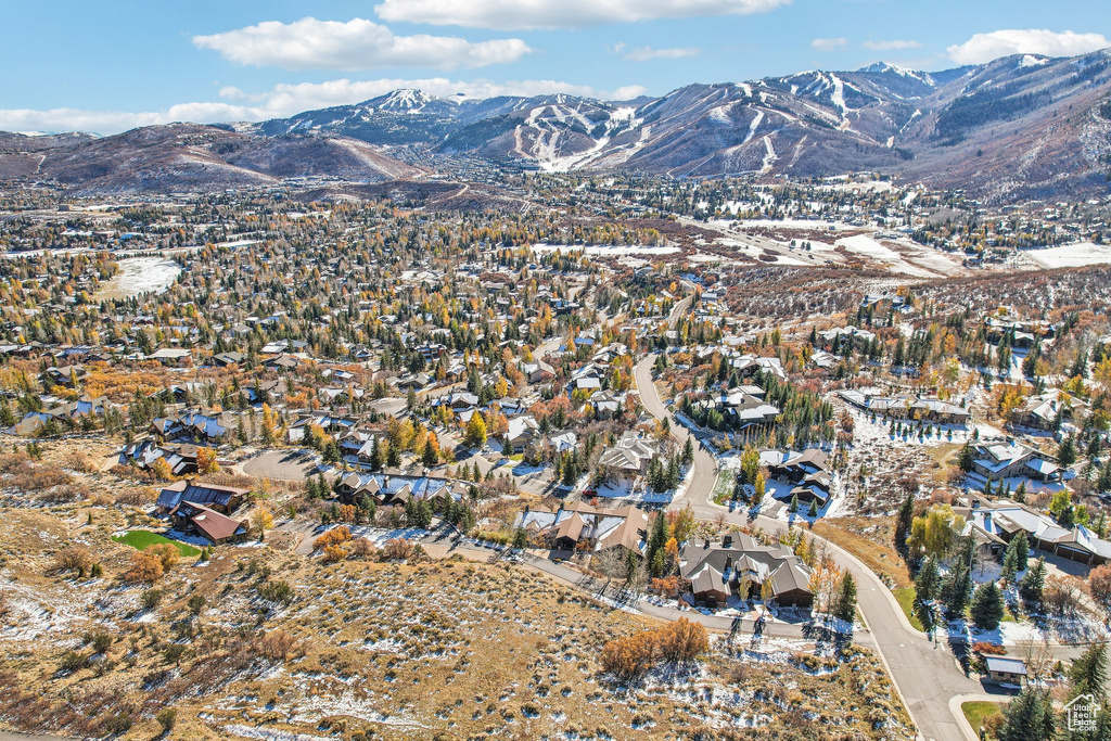 View of mountain background featuring nearby suburban area