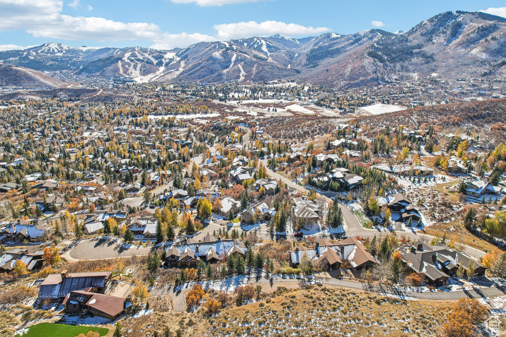View of mountain backdrop featuring nearby suburban area