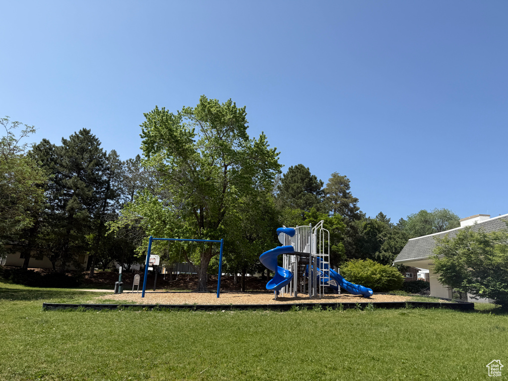 Community jungle gym featuring a yard