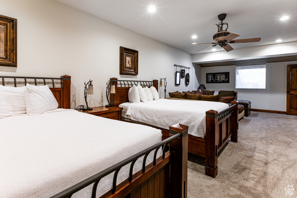 Bedroom featuring light carpet, recessed lighting, baseboards, and ceiling fan